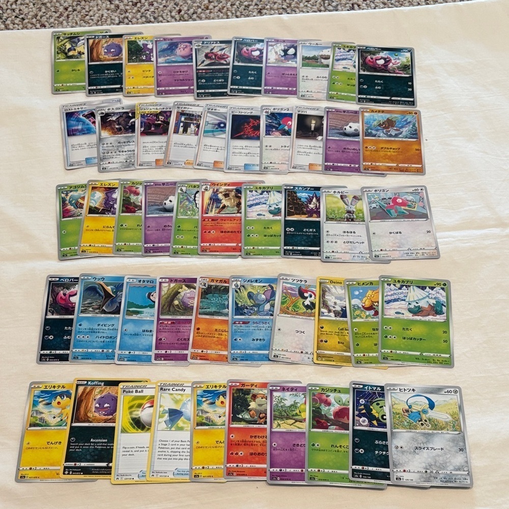 Assorted Pokémon Trading Cards. 50 Count